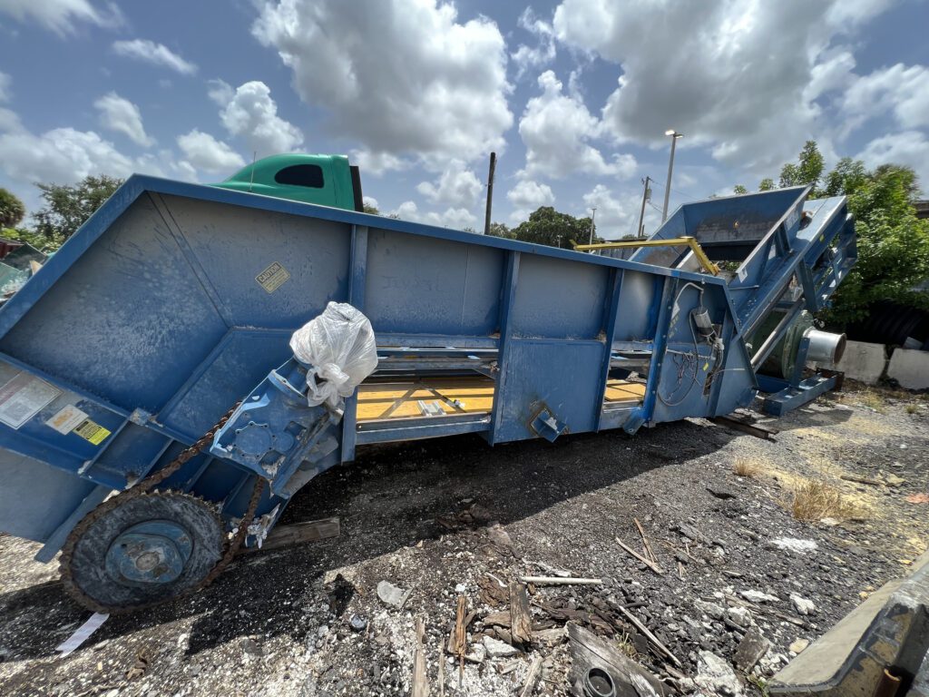 Hustler Steel Belt in-feed Conveyor