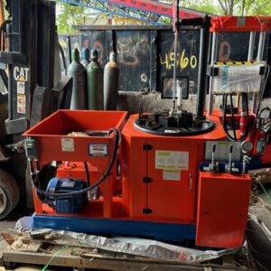 frontal view of a used electric motor recycling machine, Double platform 460V.