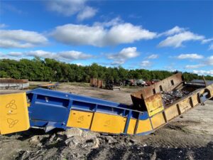 Sherbrook steel Z-pan conveyor in a yard