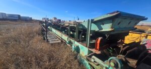 72 foot radial stacker conveyor in a field, side view