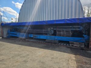 Bucket elevators stored in a container