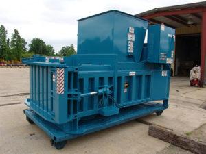 Blue closed-door horizontal baler for multiple materials