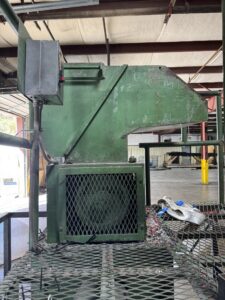Green Cumberland 14 x 16 granulator on a platform