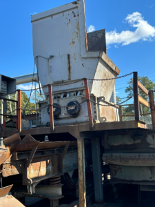 SSI Model 6000 slow speed shredder on its stand