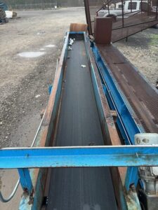 CP sliderbed conveyor, view down the belt