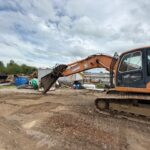 Doosan DX255LC excavator with Genesis GXP400R rotating shear