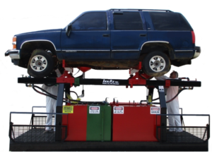 Vehicle drainage rack holding an SUV over fluid tanks