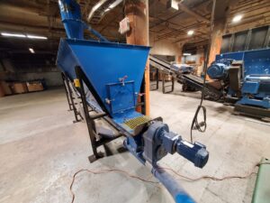 Blue 180 cubic foot dosing hopper with auger drive