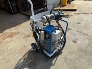 Lukas LSI-400E handheld shear on its cart with power unit