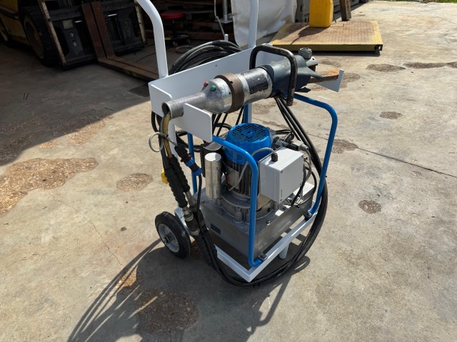 Lukas LSI-400E handheld shear on its cart with power unit