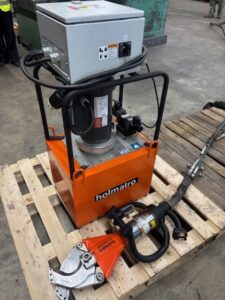 Holmatro 20S10 handheld shear with power pack on a pallet