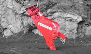 Red RSS scrap shear attachment standing on its own
