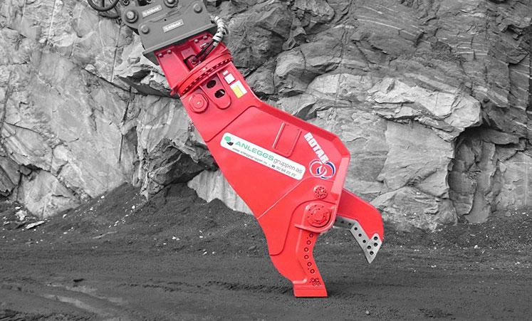 Red RSS scrap shear attachment standing on its own