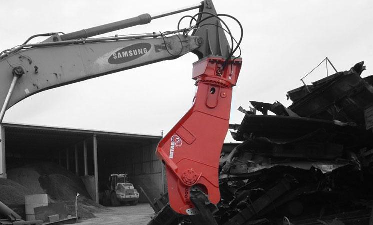RSS scrap shear on a Samsung excavator cutting scrap steel