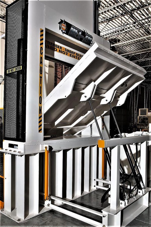 Roll splitter tilting table raised