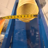 Tape measure across the output hose