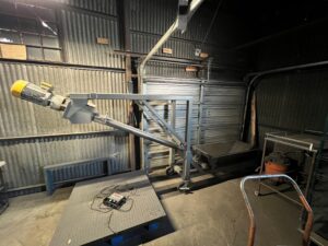 Flex screw conveyor installed with its infeed hopper