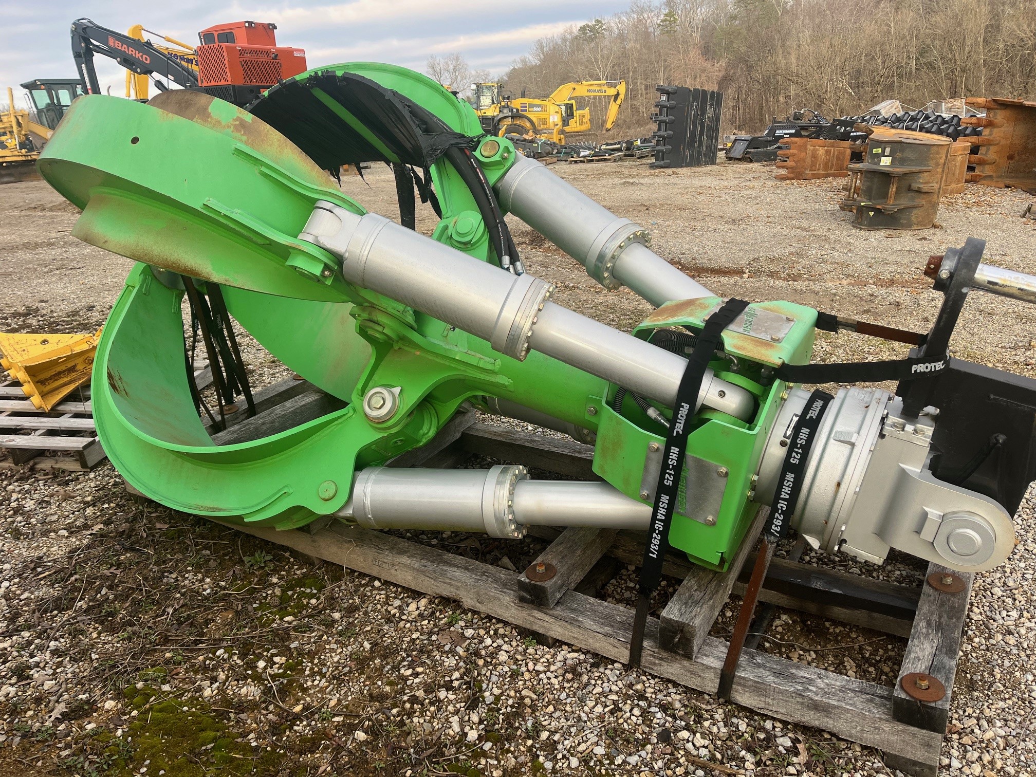 Green Rotobec 2 yard orange peel grapple, side view