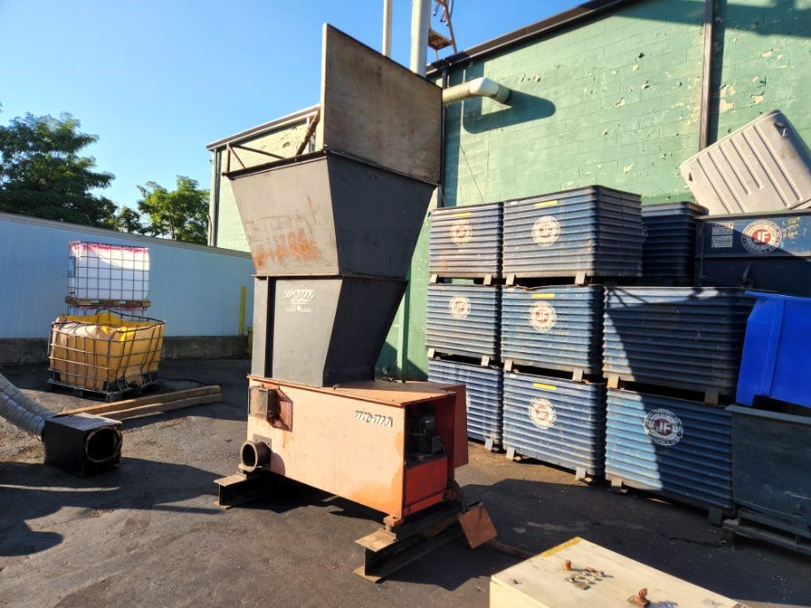 Weima waste grinder with tall hopper, side view