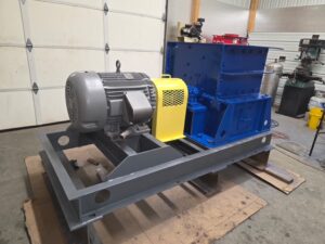 Jeffrey 30WB hammer mill with 60 hp motor on a steel skid base
