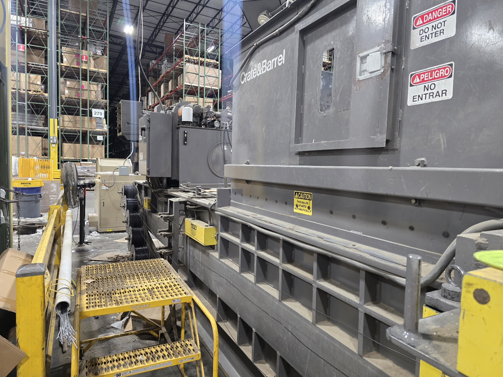Auto tie baler feed hopper with access stairs