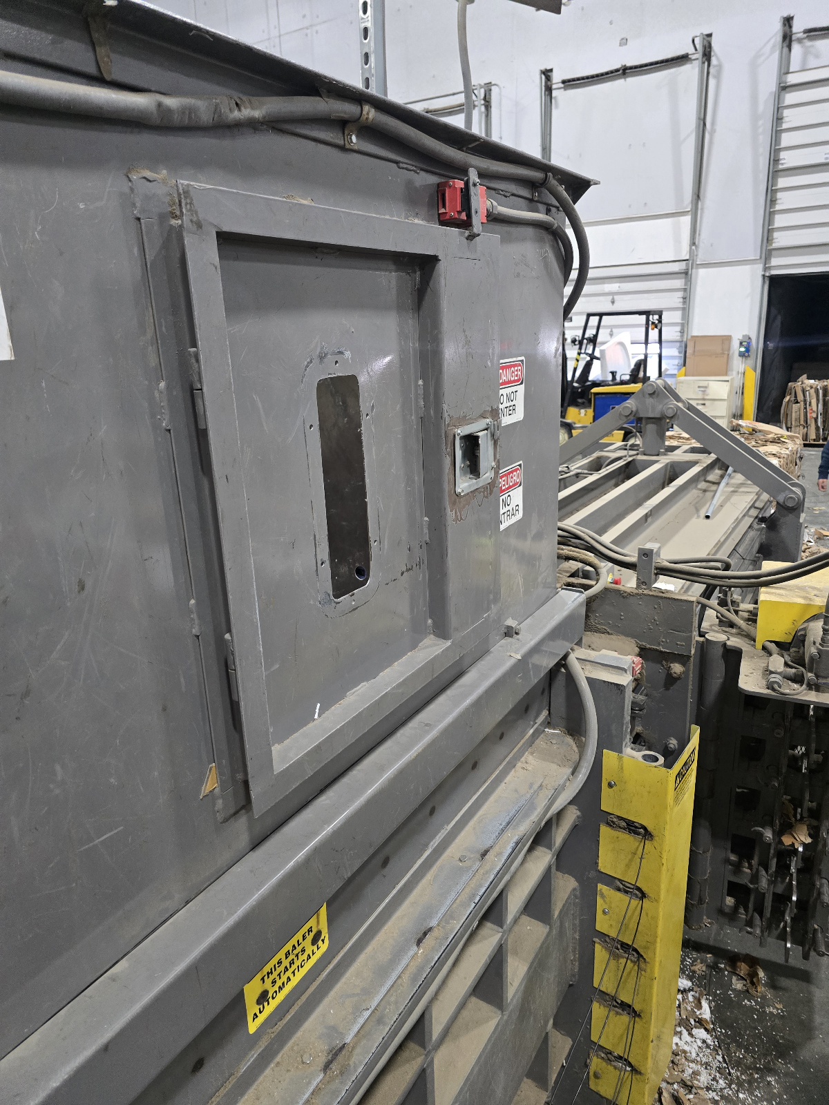 Feed hopper access door with window